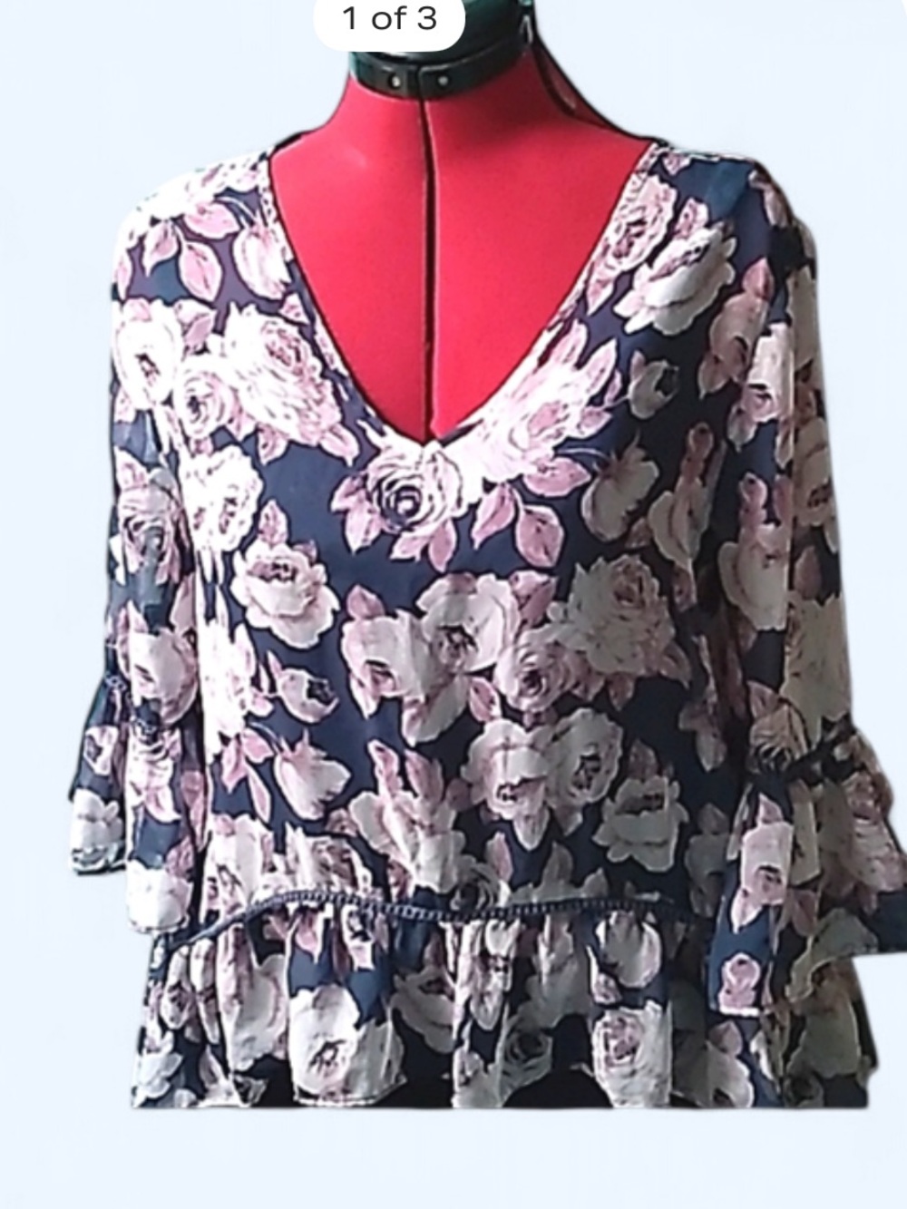 BONGO, ladies top Large flowery print flouncy bottom and sleeves